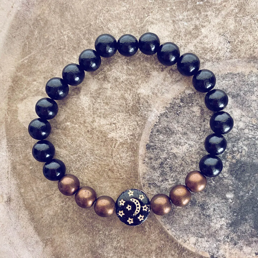 tranquility // black sandalwood and czech glass bracelet with moon & stars bead