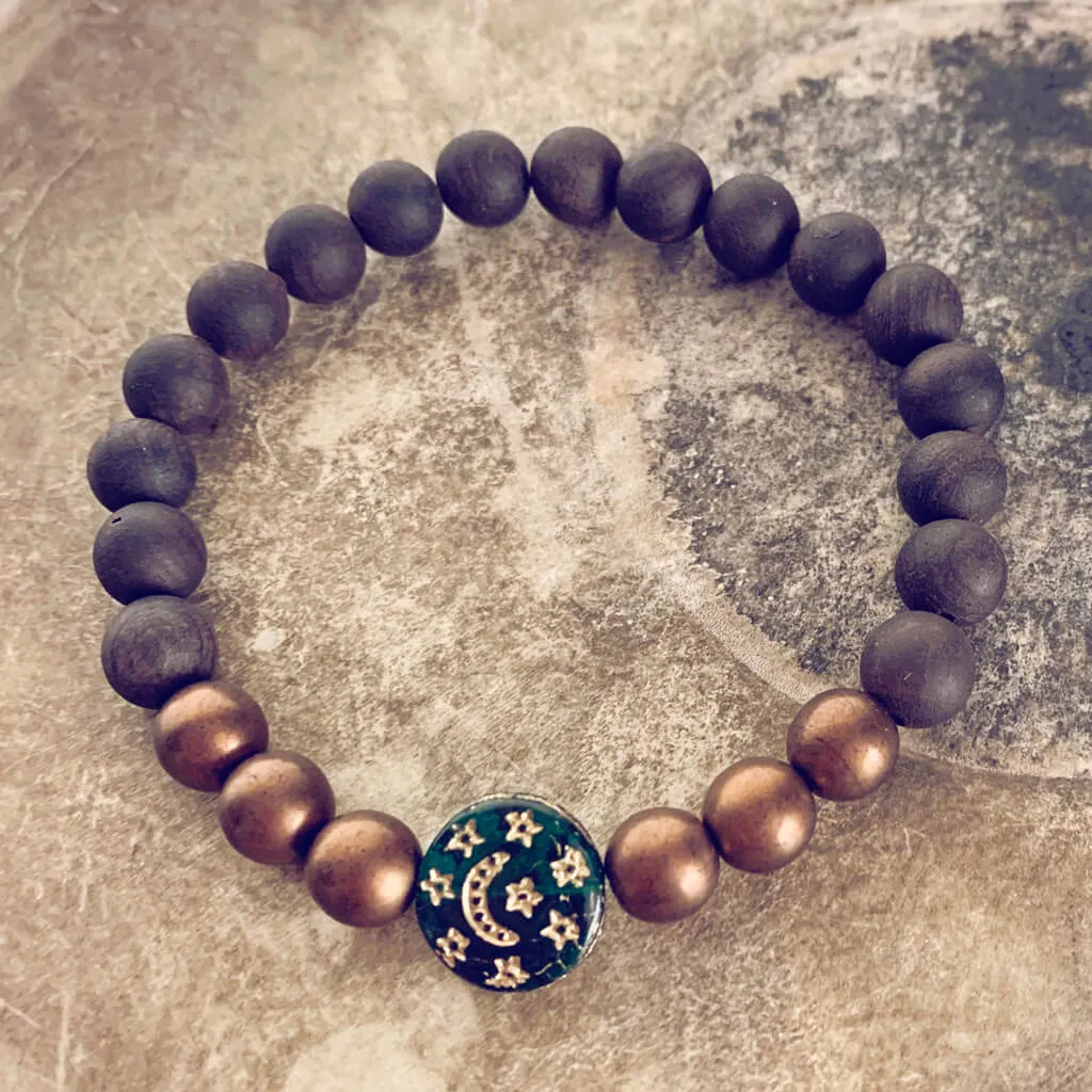 tranquility // black sandalwood and czech glass bracelet with moon & stars bead