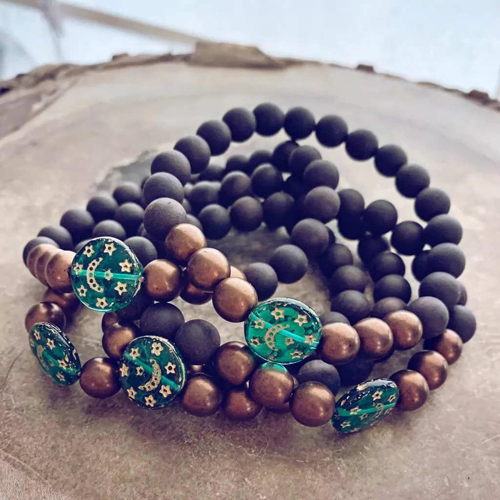 tranquility // black sandalwood and czech glass bracelet with moon & stars bead