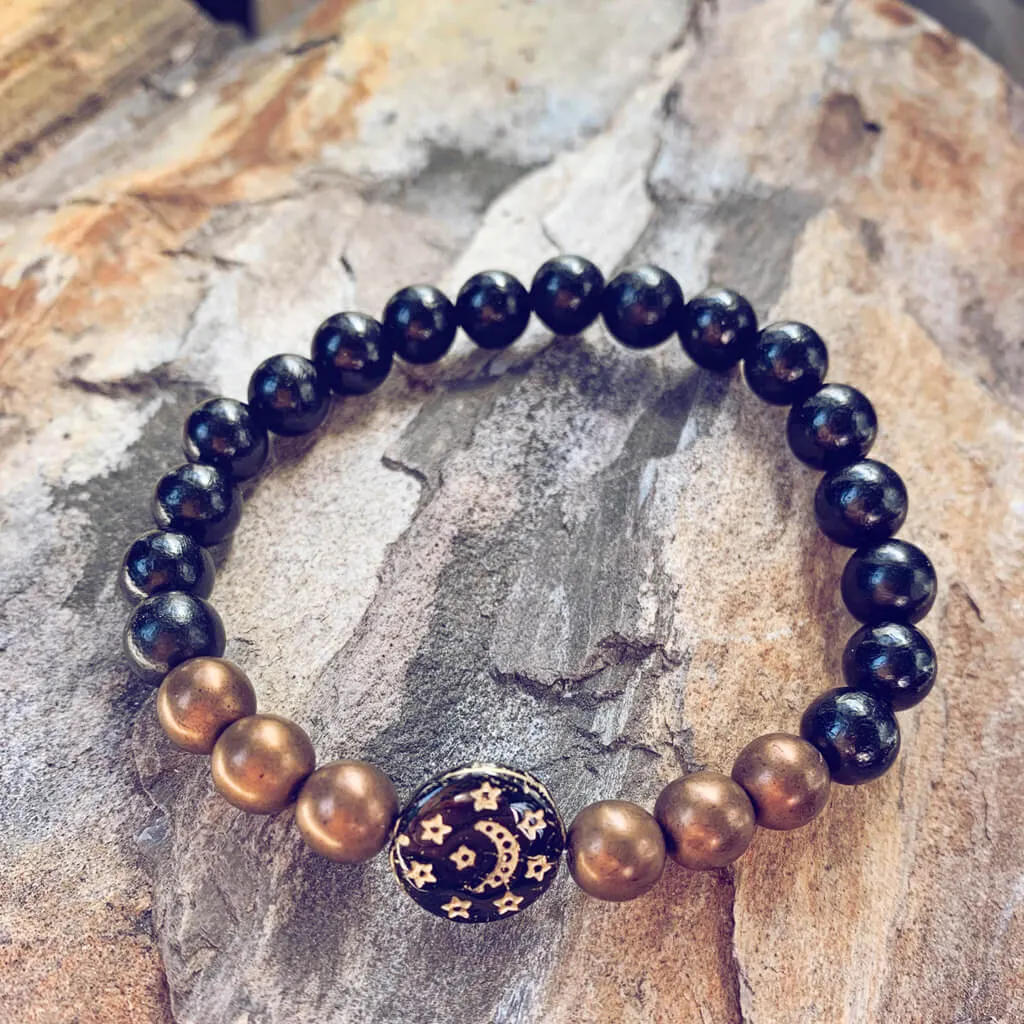 tranquility // black sandalwood and czech glass bracelet with moon & stars bead